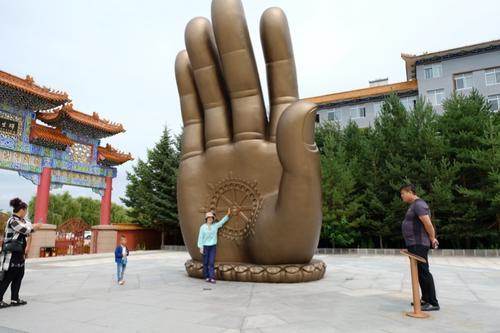 梦见手心写佛